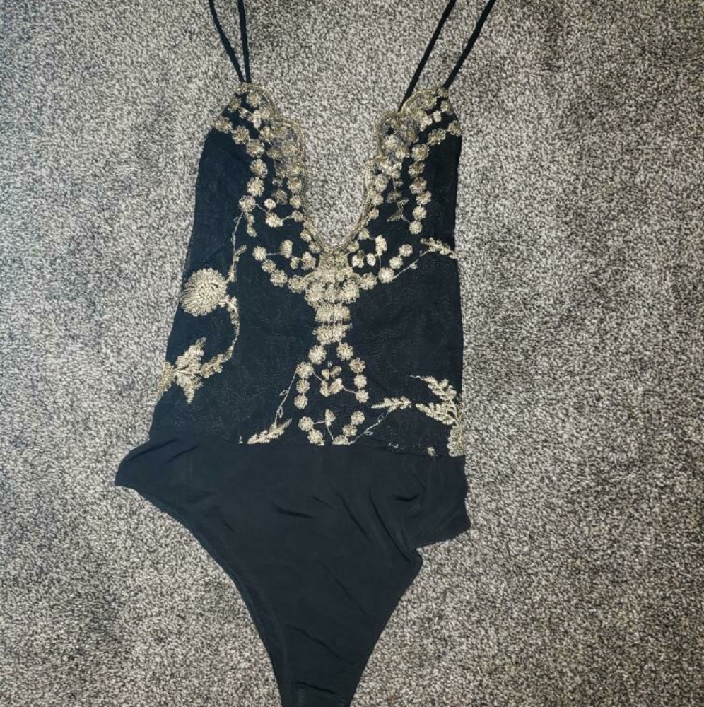 black and gold sheer bodysuit